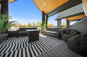 Mid-Century Luxury Rooftop Lounge Near Broadway